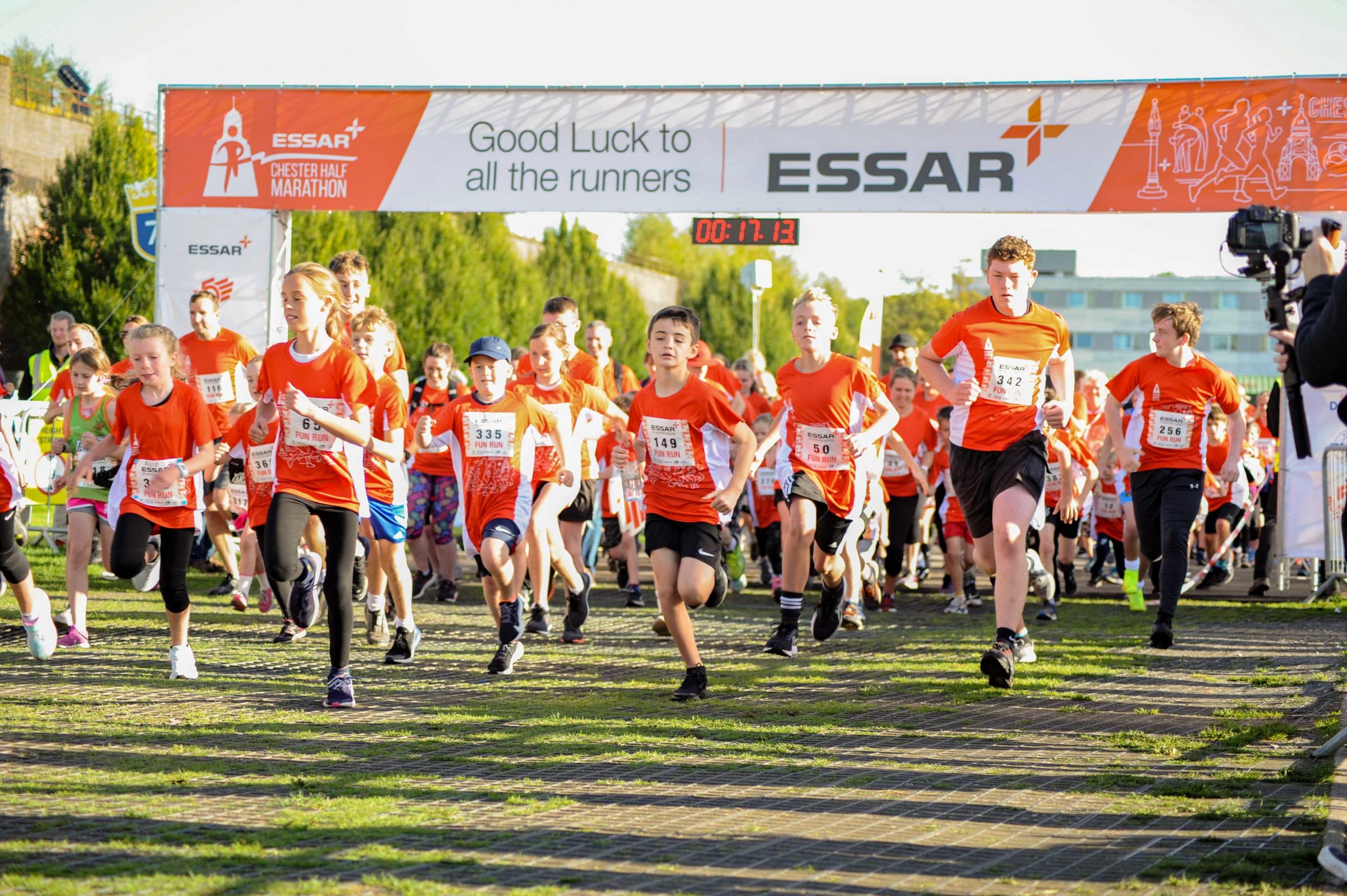 Chester Racecourse and Chester Town Hall, Essar 2021 Chester Half Marathon. Picture start of the fun run. SW19092021.