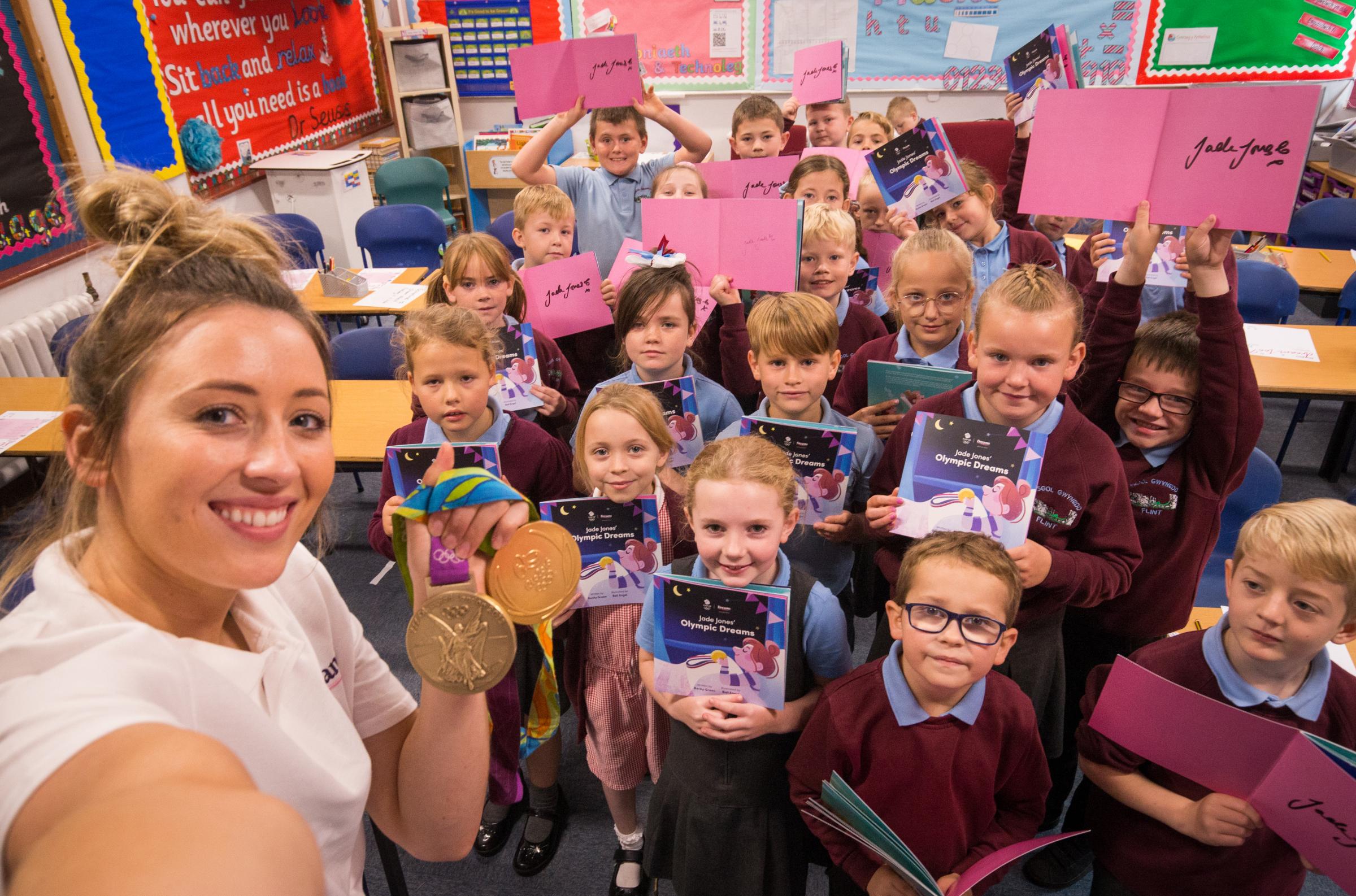 Jade Jones visited her former primary school, Ysgol Gywnedd, to see staff and students. [Images: Dreams]