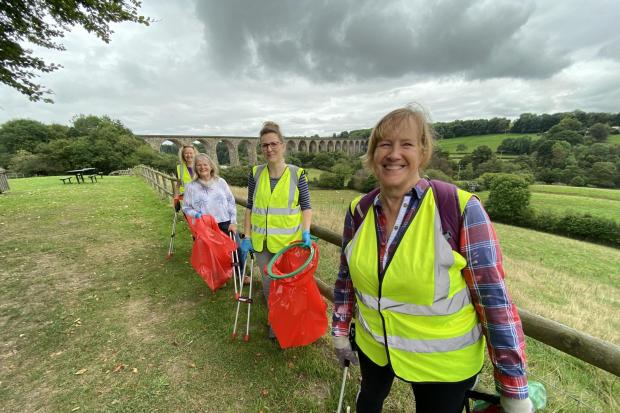 Volunteers taking part in a litter pick at Ty Mawr Country Park in Wrexham