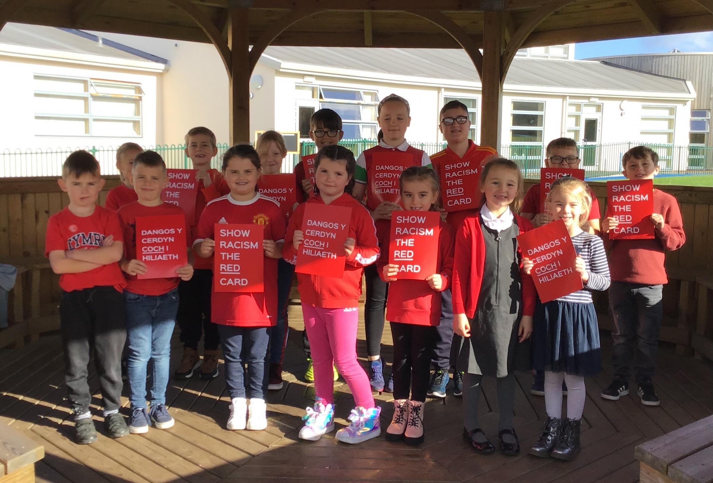 Ysgol Ty Ffynnon pupils dressed in red for Show Racism the Red Card event.