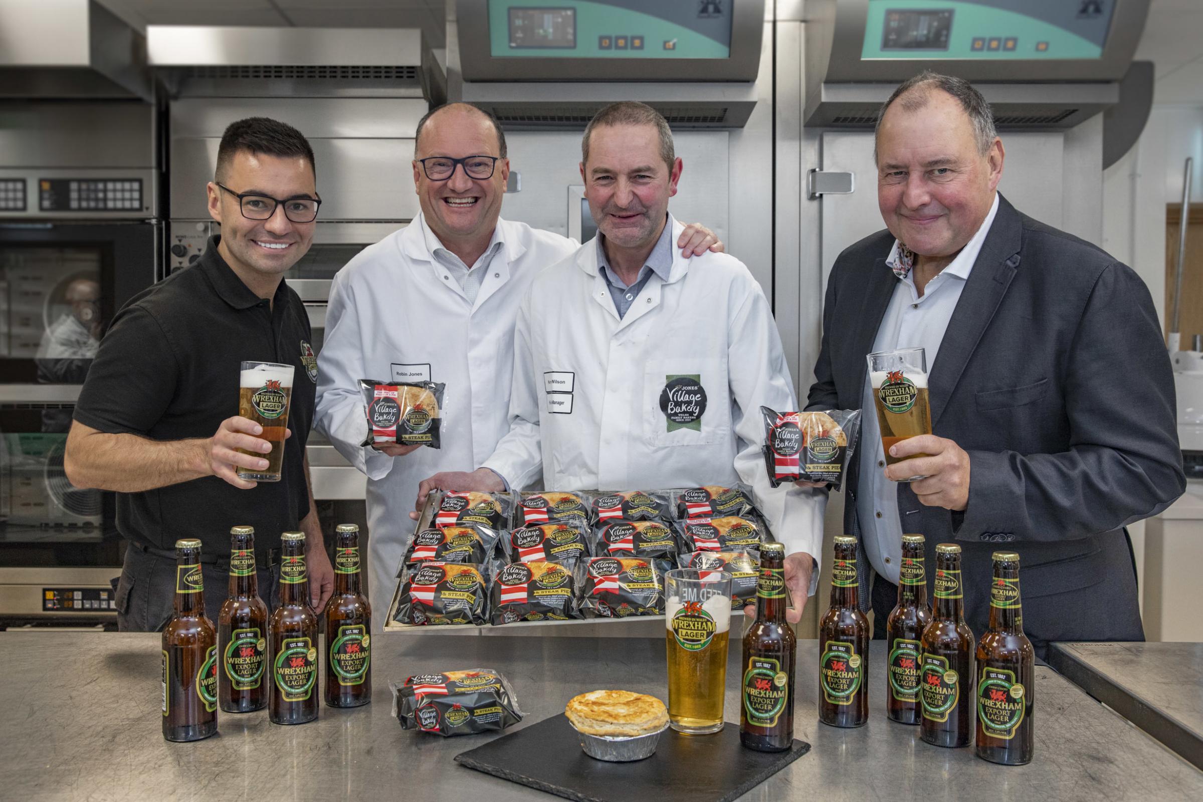 Village Bakery Wrexham produce a steak and Wrexham Lager pie; Pictured centre Robin Jones Managing Director and Kerry Wilson production Manager at Village Bakery with Joss Roberts , Wrexham Lager Sales and Operations Manager and Mark Roberts Director