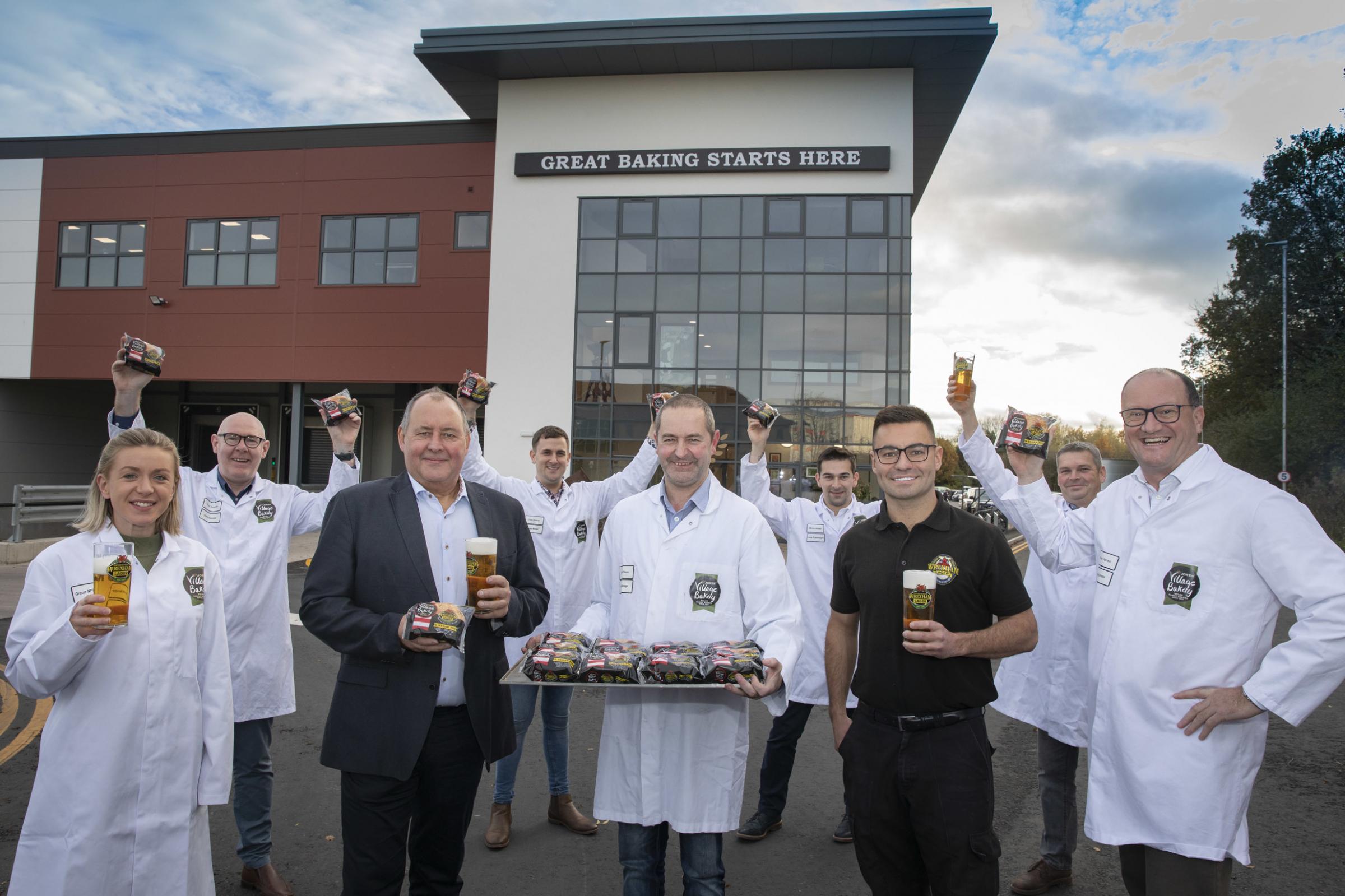 Village Bakery Wrexham produce a steak and Wrexham Lager pie; Pictured front L/R ; Florence Roberts NPD Manager Village Bakery , Mark Roberts Director of Wrexham Lager, Kerry Wilson production Manager, Village Bakery ; Joss Roberts ,