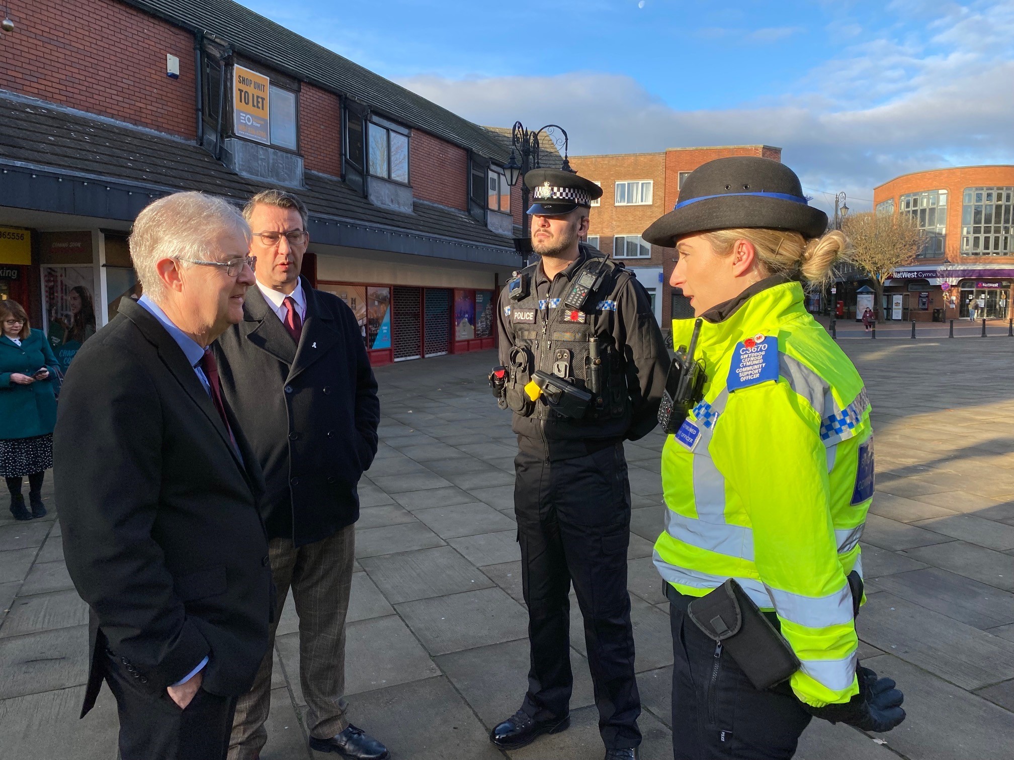 FM Mark Drakeford and North Wales Police and Crime Commissioner Andy Dunbobbin talk to police in Wrexham.