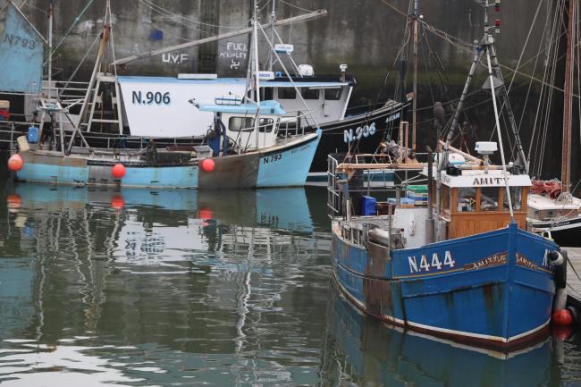 Two Northern Ireland registered vessels the Boy Joseph (left) and Amity (right) moored in Kilkeel Harbour in Co Down (Brian Lawless/PA)