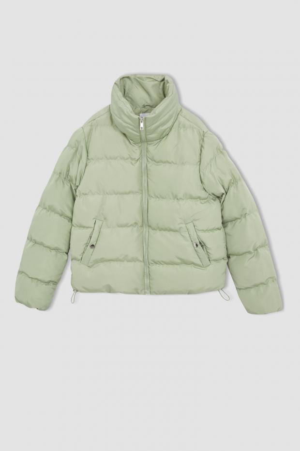 The Leader: Green basic zippered puffer jacket. Credit: Defacto
