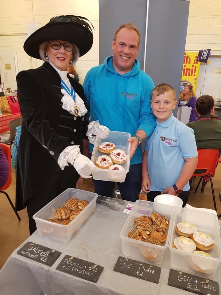 High Sherrif of Clwyd Stephanie Catherall with Doughnutology co-owner James Duckers and his son Jay Duckers.