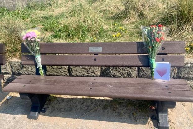 A memorial bench on Prestatyn promenade in memory of Rachel Jones..