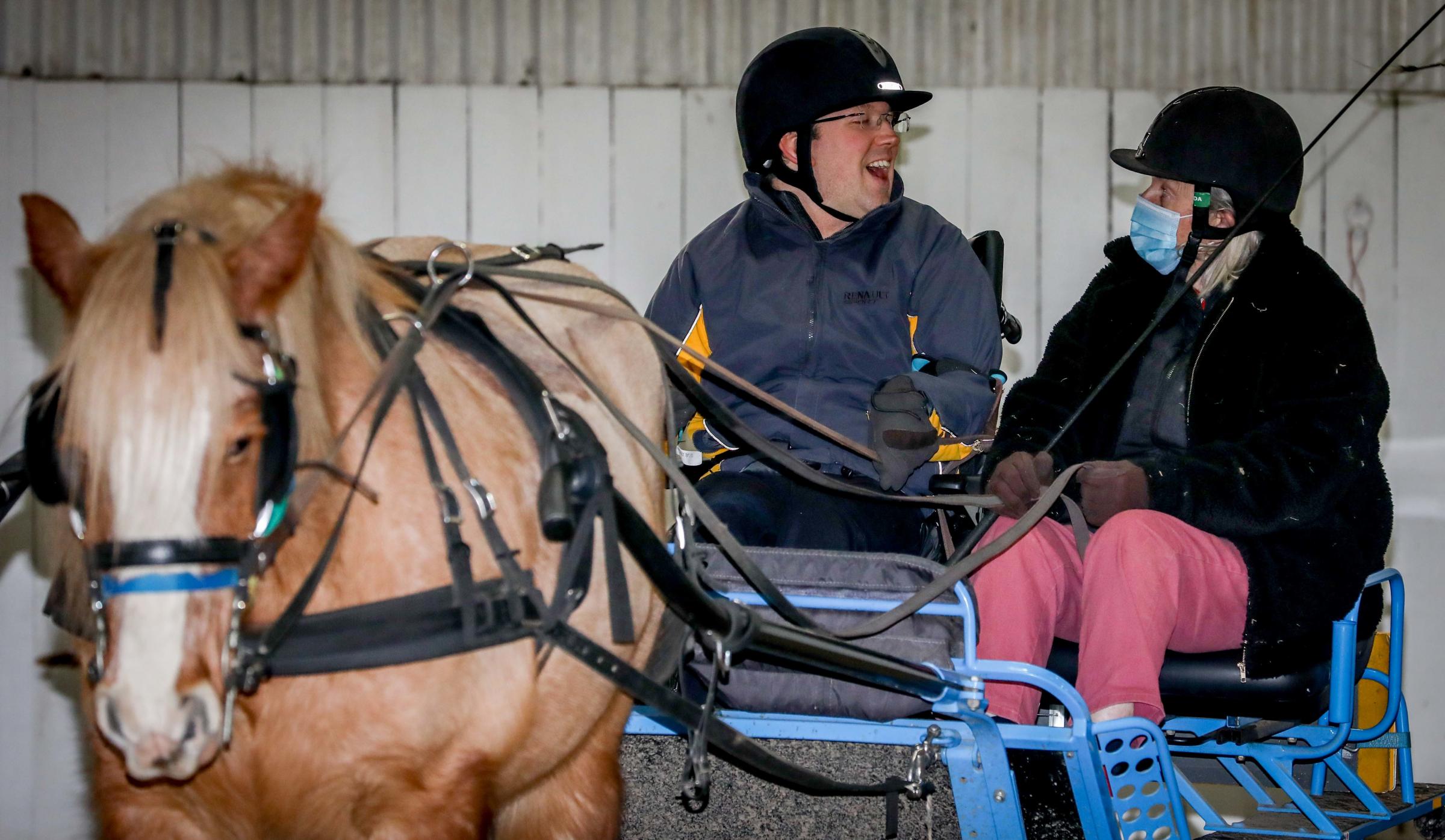 Matt with his coach Ann Connolly and Mack the horse honing his carriage riding skills.