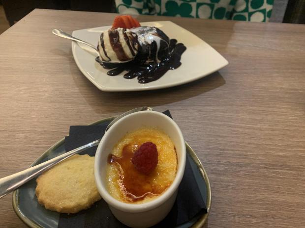The Leader: Our desserts. In front is the creme brulee and behind is the chocolate fondant.