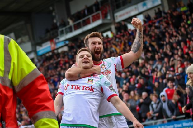 The Leader: Paul Mullin and Ollie Palmer celebrate in the FA Trophy semi final win over Stockport.