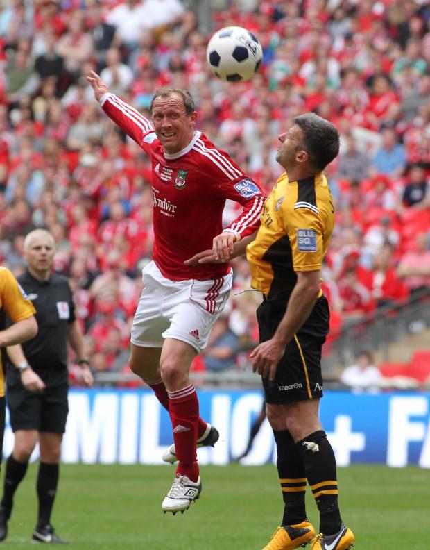 The Leader: Wrexham v Newport in the Conference Playoff final at Wembley Andy Morrell wins the header.