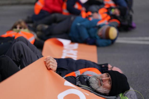 The Leader: An activist from Just Stop Oil takes part in a blockade at the Kingsbury Oil Terminal, Warwickshire. (Picture: PA Wire)