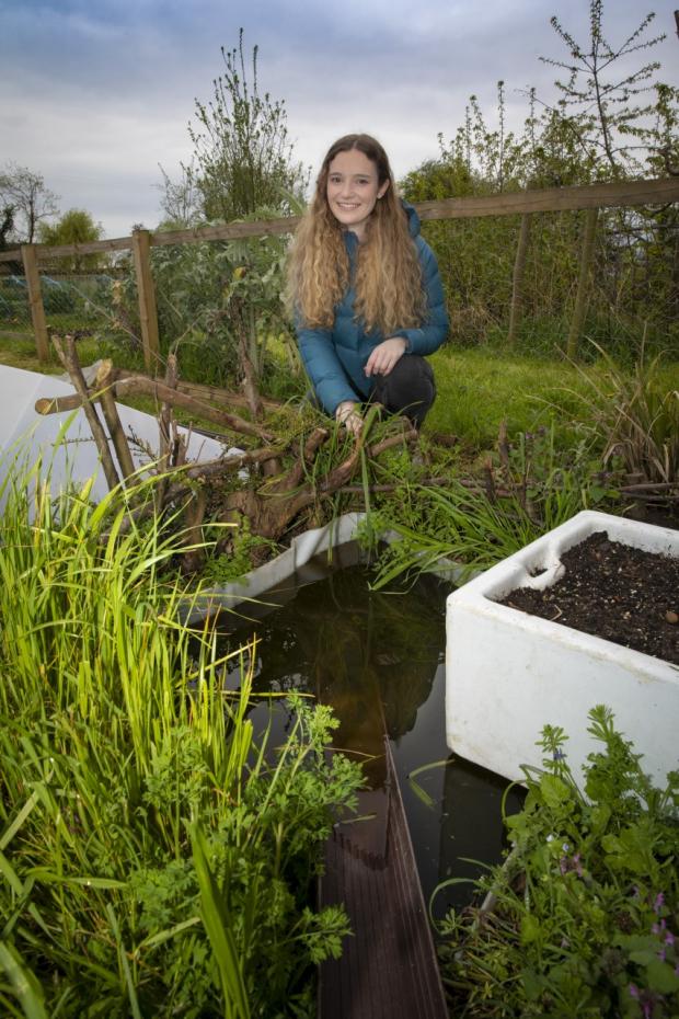 The leader: Cara Roberts of the Green Communities project in Cadwyn Clwyd, in the Holt housing estates.