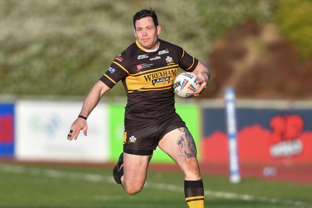 Rob Massam of North Wales Crusaders  in action during the game.