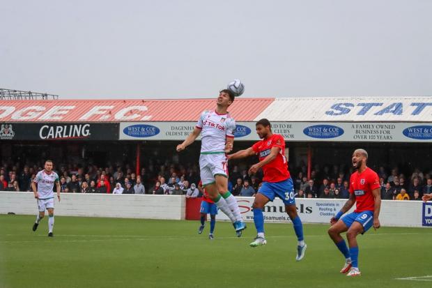 Jordan Davies goes up for a header against Dagenham. Picture by GEMMA THOMAS