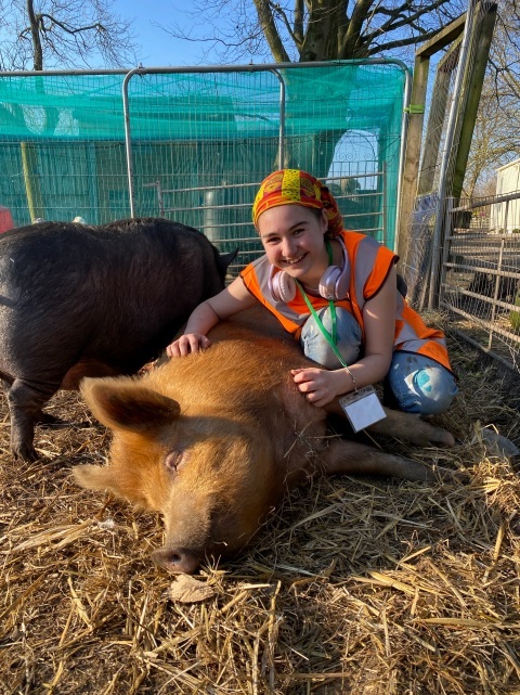 Lily with Archie, the Tamworth pig.