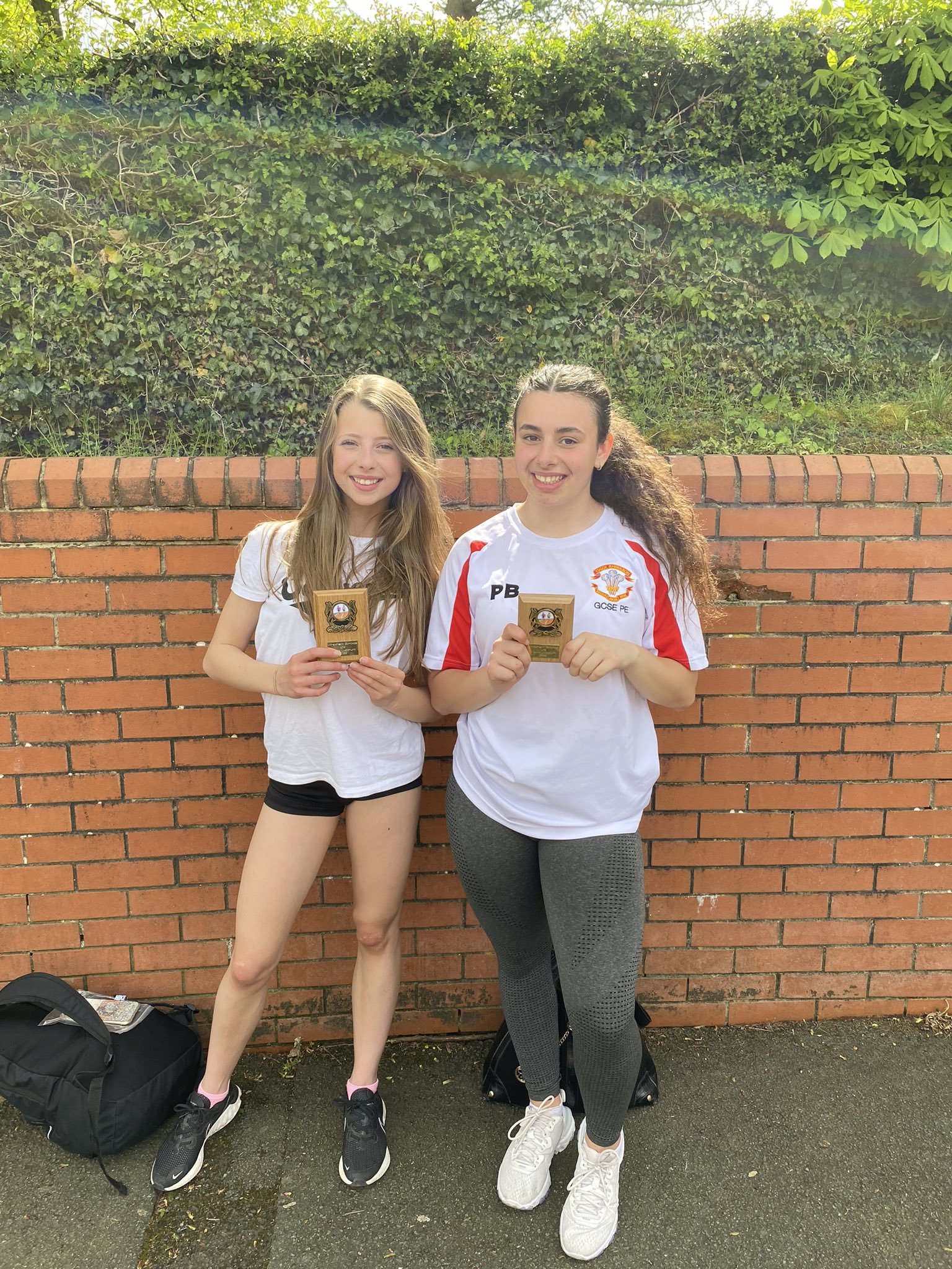 Poppy Bostock and Lucy Jones with their awards.