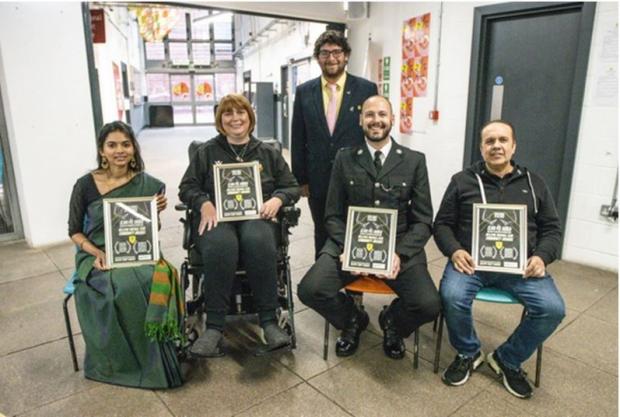 The Leader: Bellevue FC's Delwyn Derrick with the four 'community champions' - Krishnapriya Ramamoorthy, Kerry Evans, Dave Smith and Amjid Hussain. Picture by Craig Colville.