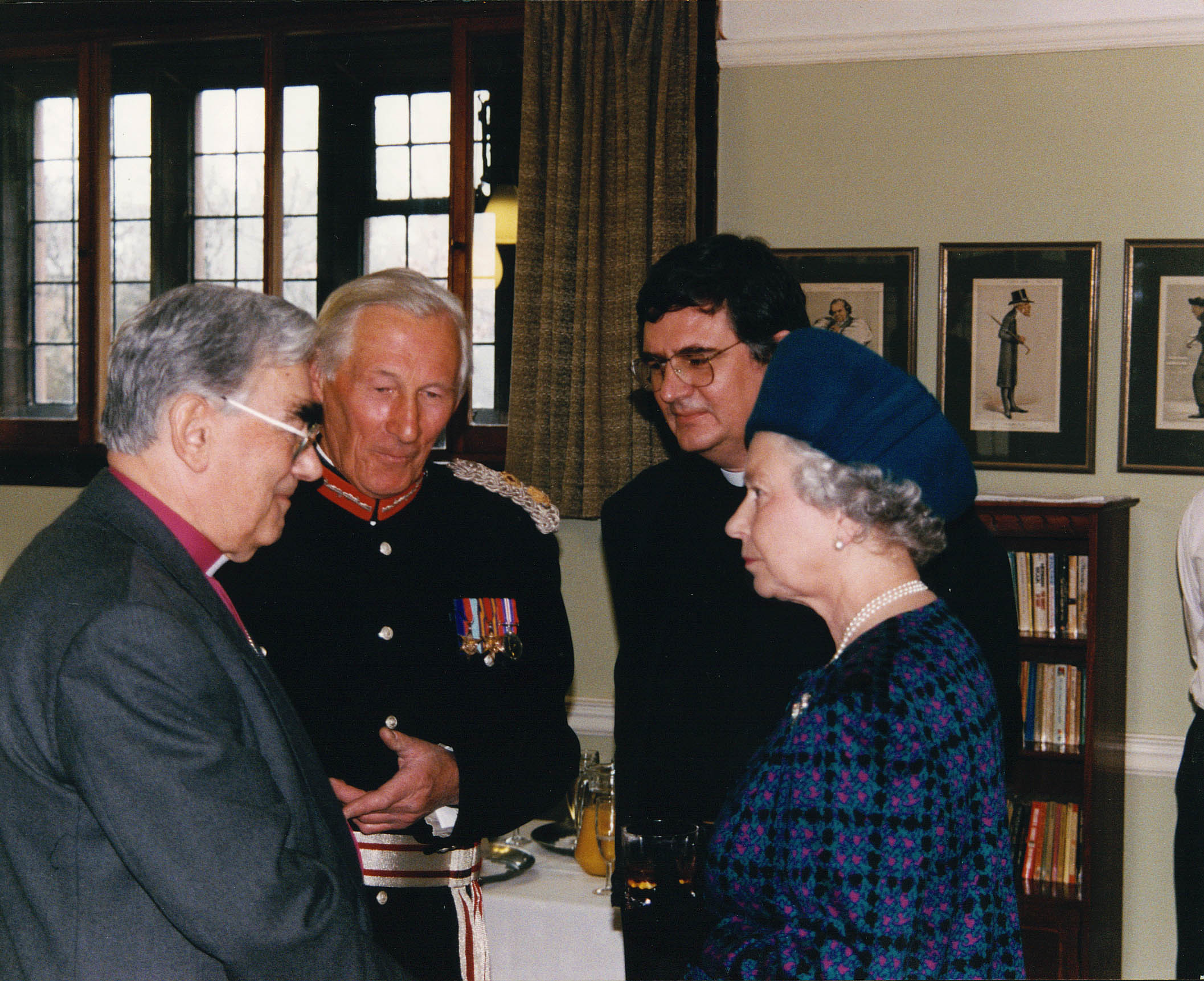 The Most Revd Alwyn Rice Jones, Archbishop of Wales, Peter Francis and Queen Elizabeth II in the Gladstone Room.