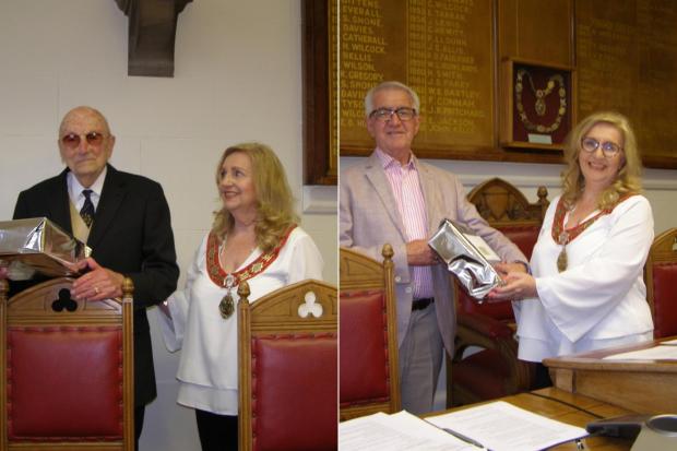 The Leader: Retiring Councillors John Thornton and Neville Phillips receiving their gifts from the outgoing town mayor, Councillor Vivienne Blondek. 