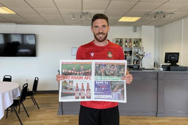 Ben Tozer with the Leader's 40-page Wembley pull out.