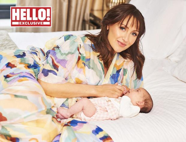 The Leader: Catherine Tyldesley with her baby daughter Iris as they appear in this week's edition of the magazine. Credit: Hello! Magazine/PA