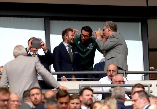 The Leader: David Beckham, Ryan Reynolds and Will Ferrell share a joke at the FA Trophy final at Wembley. (PA image)