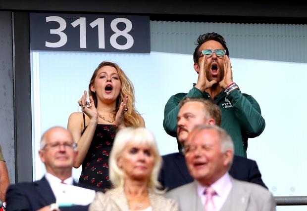 The Leader: Blake Lively and Ryan Reynolds cheer on the Reds at Wembley. (PA image)