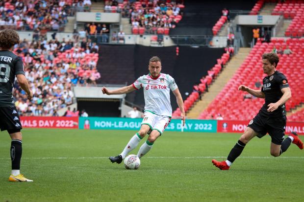 Wrexham captain Luke Young on the ball. Picture by GEMMA THOMAS