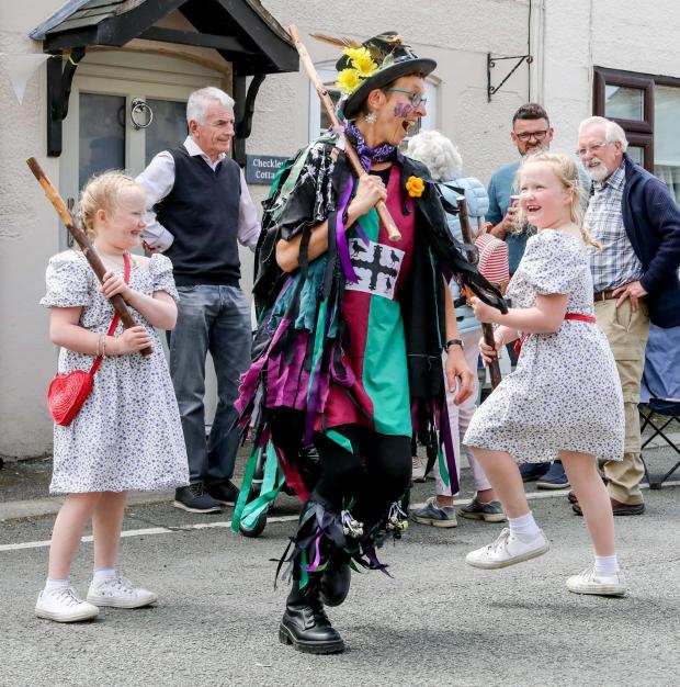 The Leader: Northop Platinum Jubilee street party Twins Megan and Ffion Butters dancing with the Tegeingl Tanglers (image:RickMatthews)