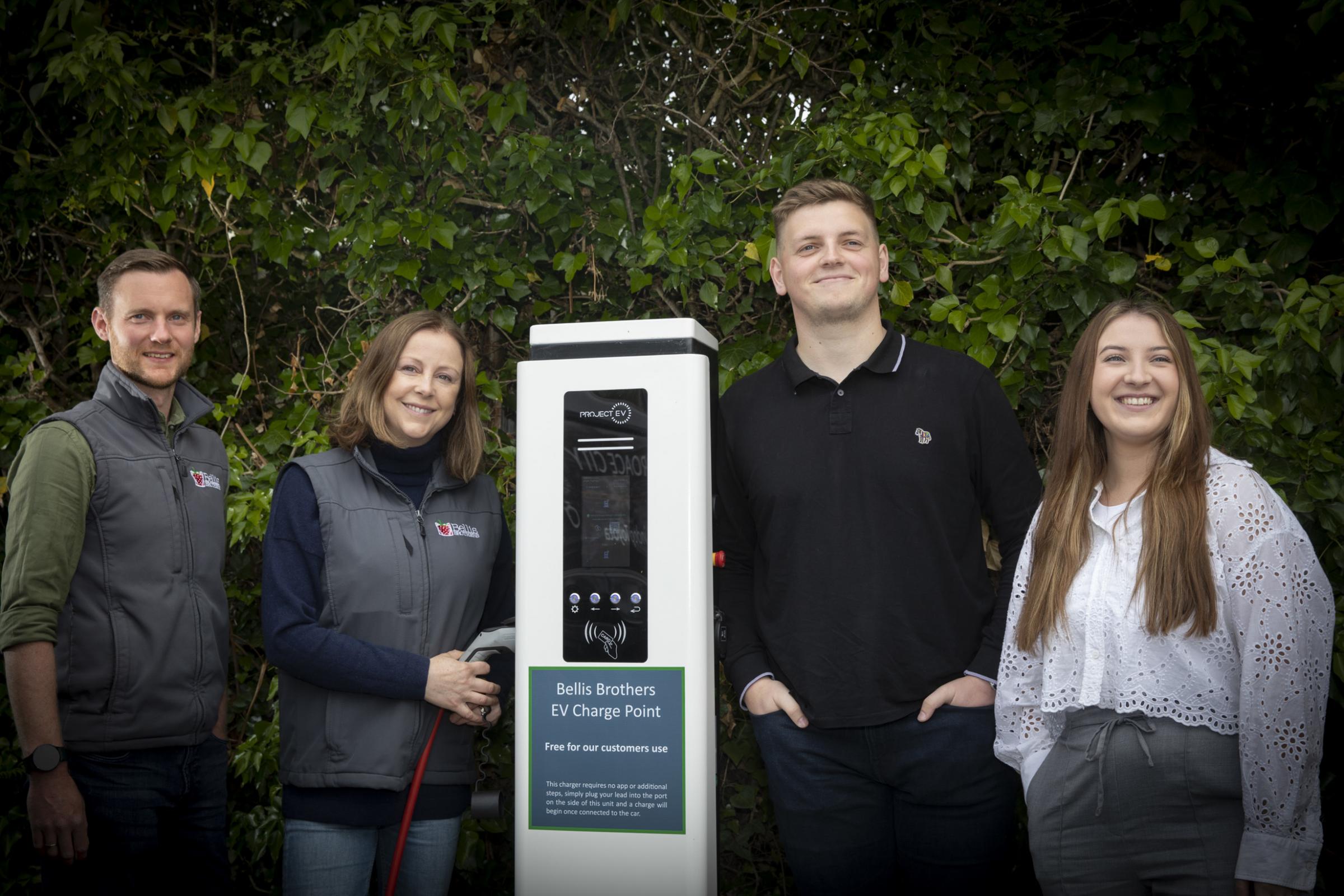Powering up – from left, Mark Jones and Elizabeth Bellis Marks, of Bellis Brothers with Gregg White and Millie Rawson, of Rawson EV Power. Photo: Mandy Jones