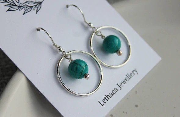 Beaded dangle hoop earrings by Shauna Stratton at Lethaea Jewellery.