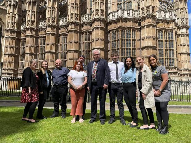 The Leader: Paul Ward and Karen Robinson, Edwin Duggan, Jade's sister Pip and her partner Liam, Jade's friends Taylor, Flossy and Emily and Jade's Aunt Angela, with Mark Tami MP during the group's visit to Parliament. Image provided by Edwin Duggan