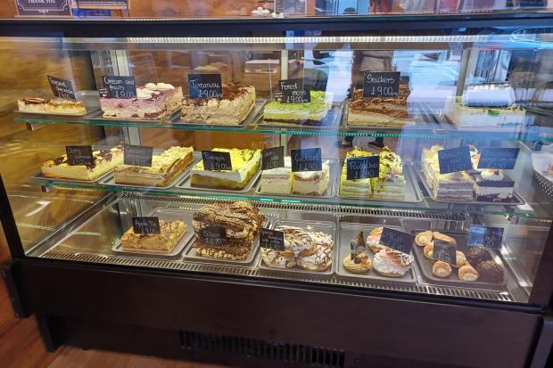 The impressive variety of cakes on display.