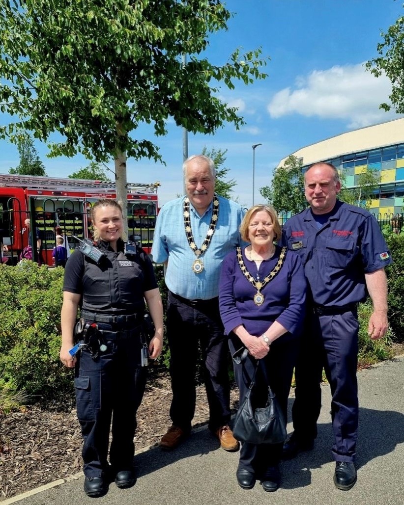 Cllr Ian Hodge, Mayor of Holywell and Lyn Hodge, Mayoress of Holywell, with representatives from the local police and fire services. 