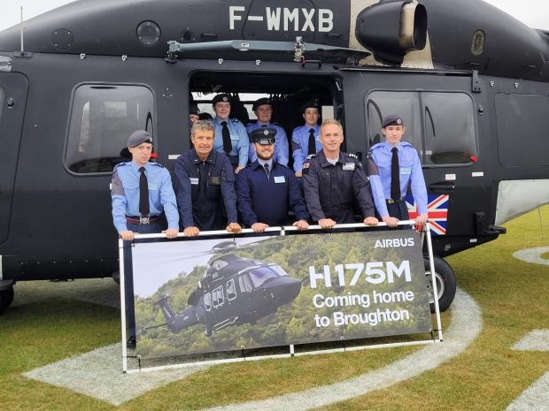 The Leader: Local air cadets with the pilots of the H175M which touched down in Broughton on Friday.