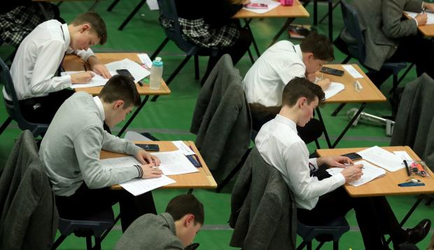 The Leader: An AQA walkout could delay GCSE and A Level results. Picture: PA