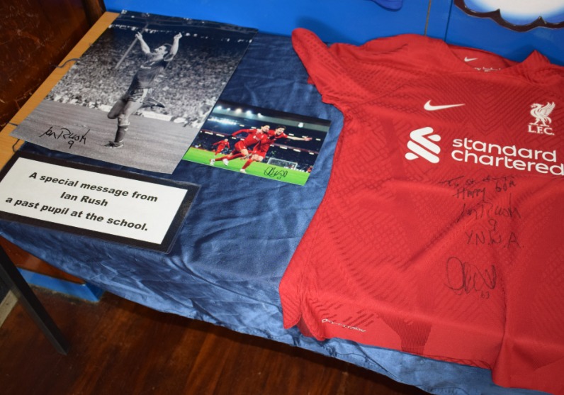 Footballing legend Ian Rush, a former pupil at the school, sent a signed shirt and a good luck message.