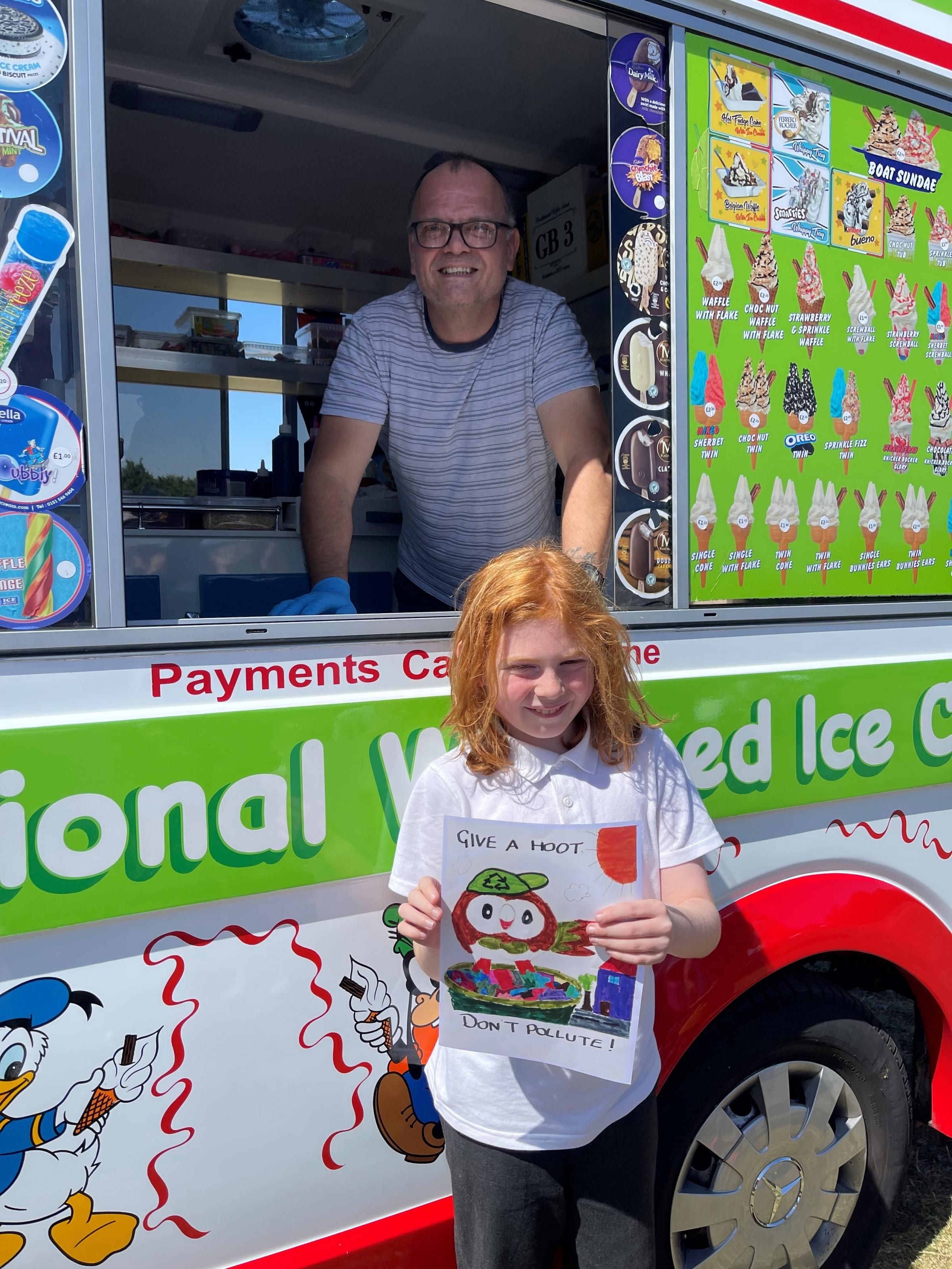 Stone Boden, who won a Deeside Creameries poster design competition, pictured with Paul in one of their ice vcream vans.