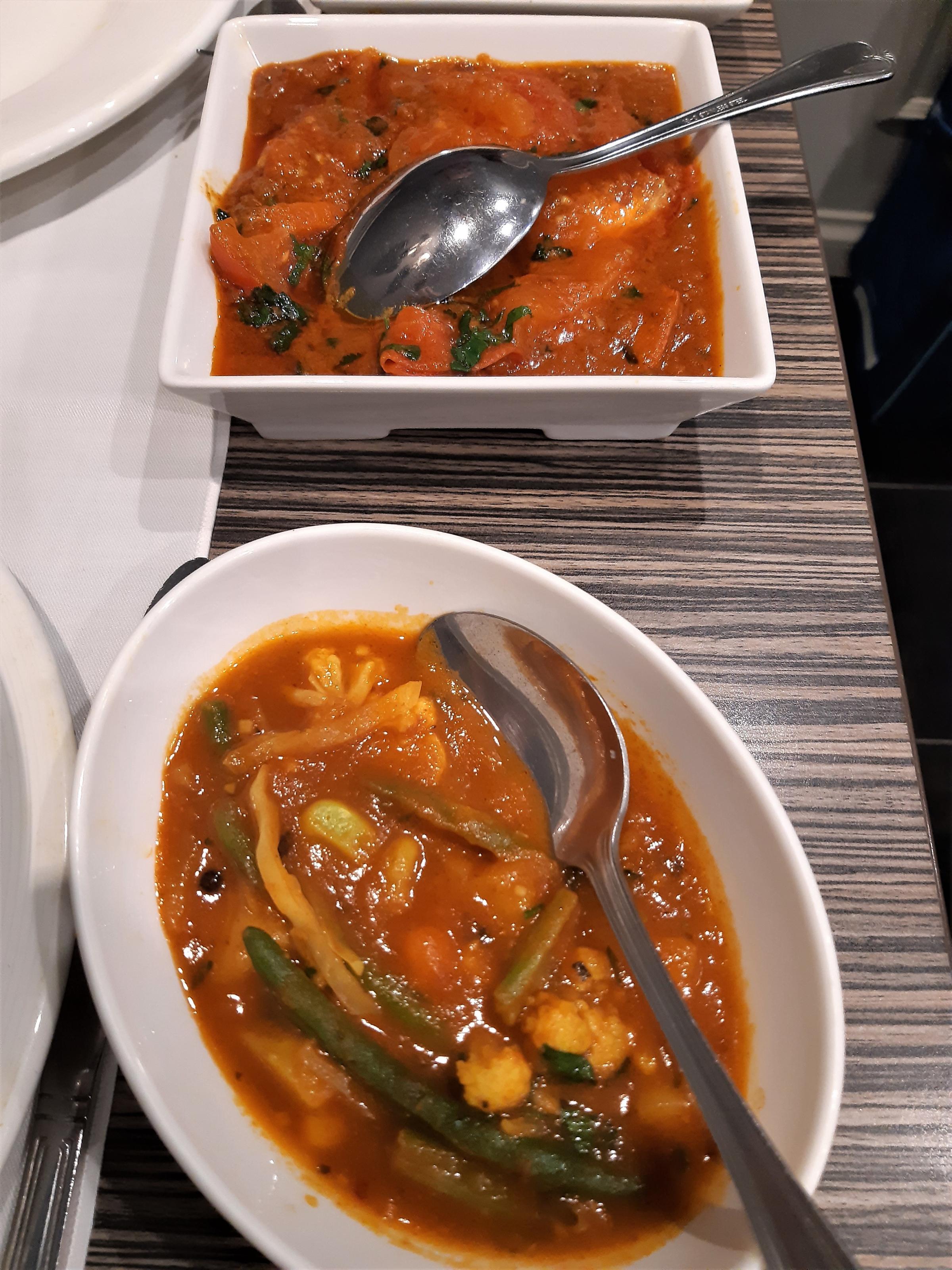 The biryani curry (bottom) and rogan josh (top) at Parivaar.