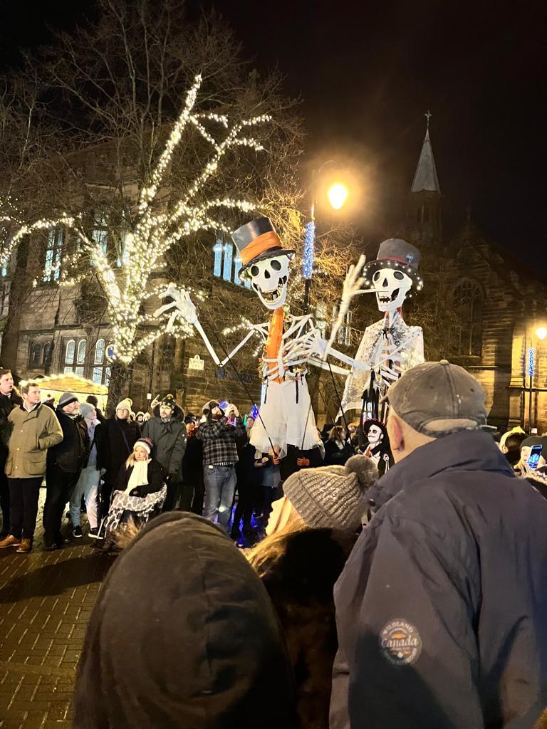 Saturnalia and Winter Watch parade led by giant skeletons from Chester Town Hall.