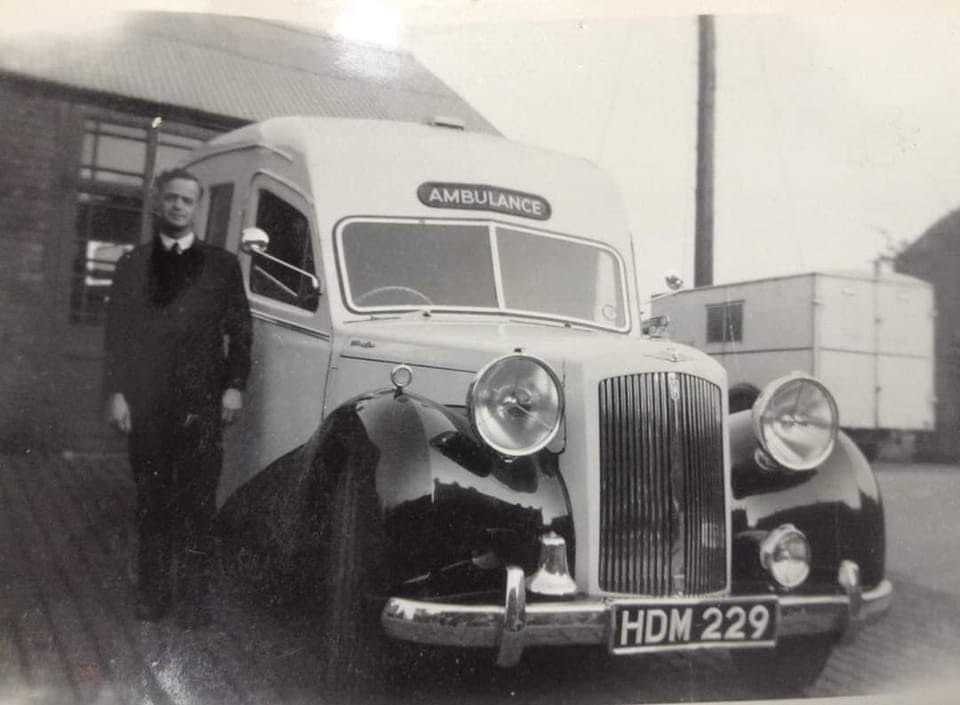 Moira Owens dad with his Austin Sheerline ambulance.