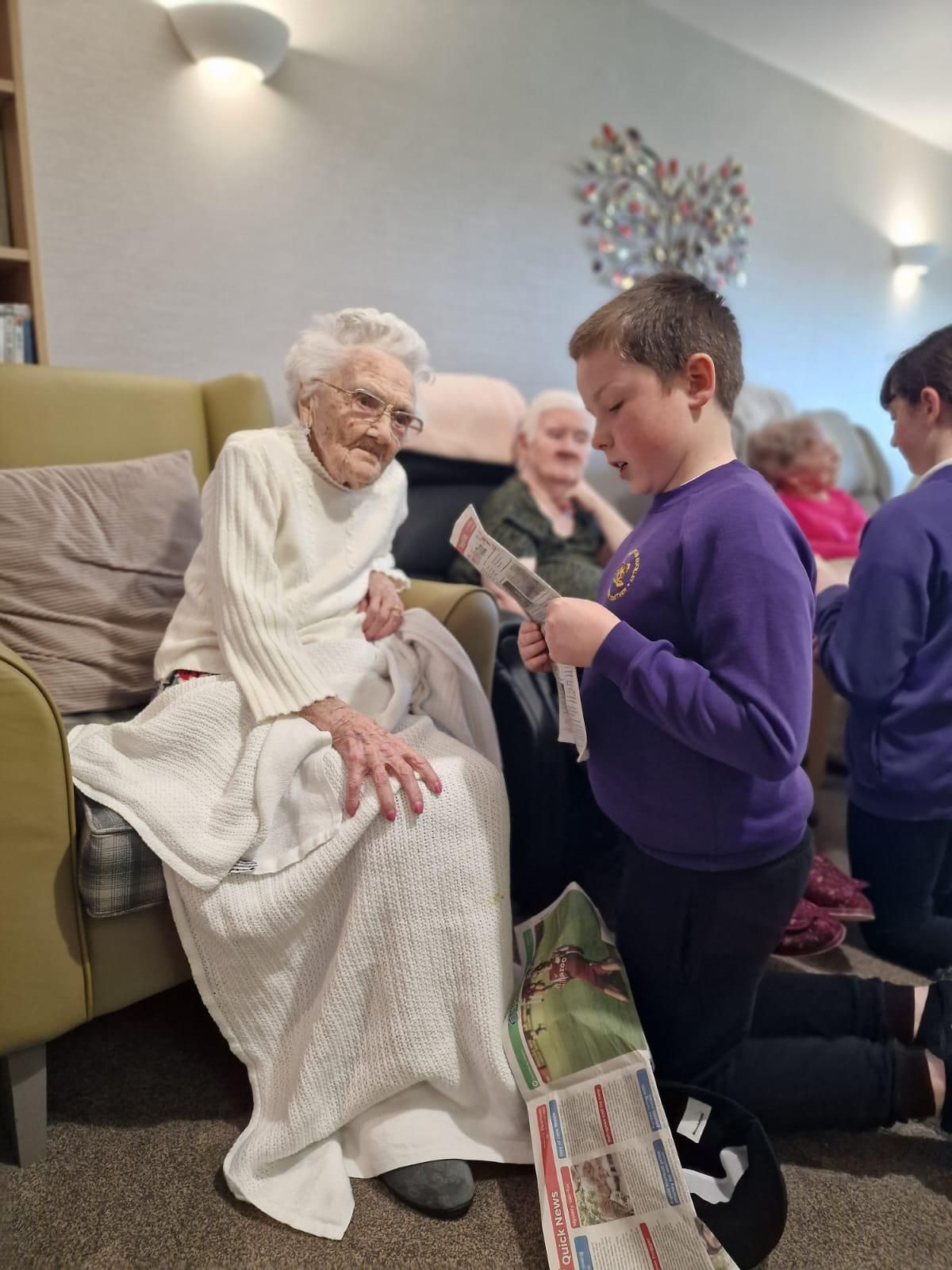 Pupils from Westwood CP School visit residents of Marleyfield Care Home in Buckley.