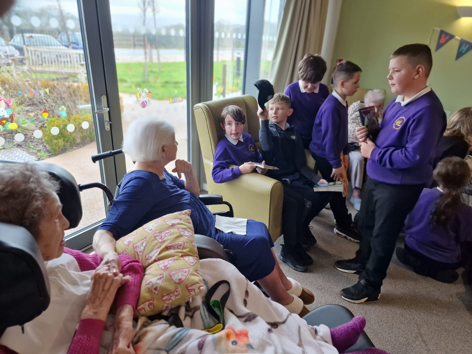  Pupils from Westwood CP School visit residents of Marleyfield Care Home in Buckley.