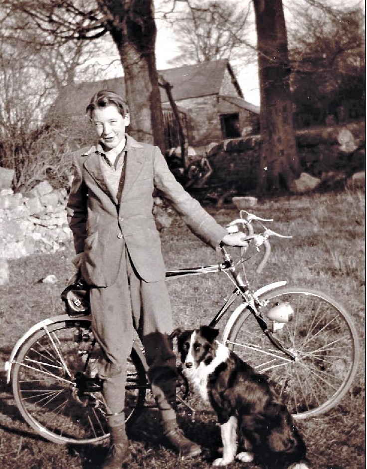 A young Elvet Pierce with his faithful dog, Floss, and Hercules bicycle.