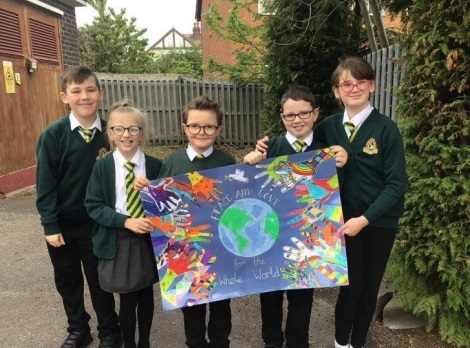 Acton Park Primary pupils with artwork for the Sri Chinmoy Peace Run.