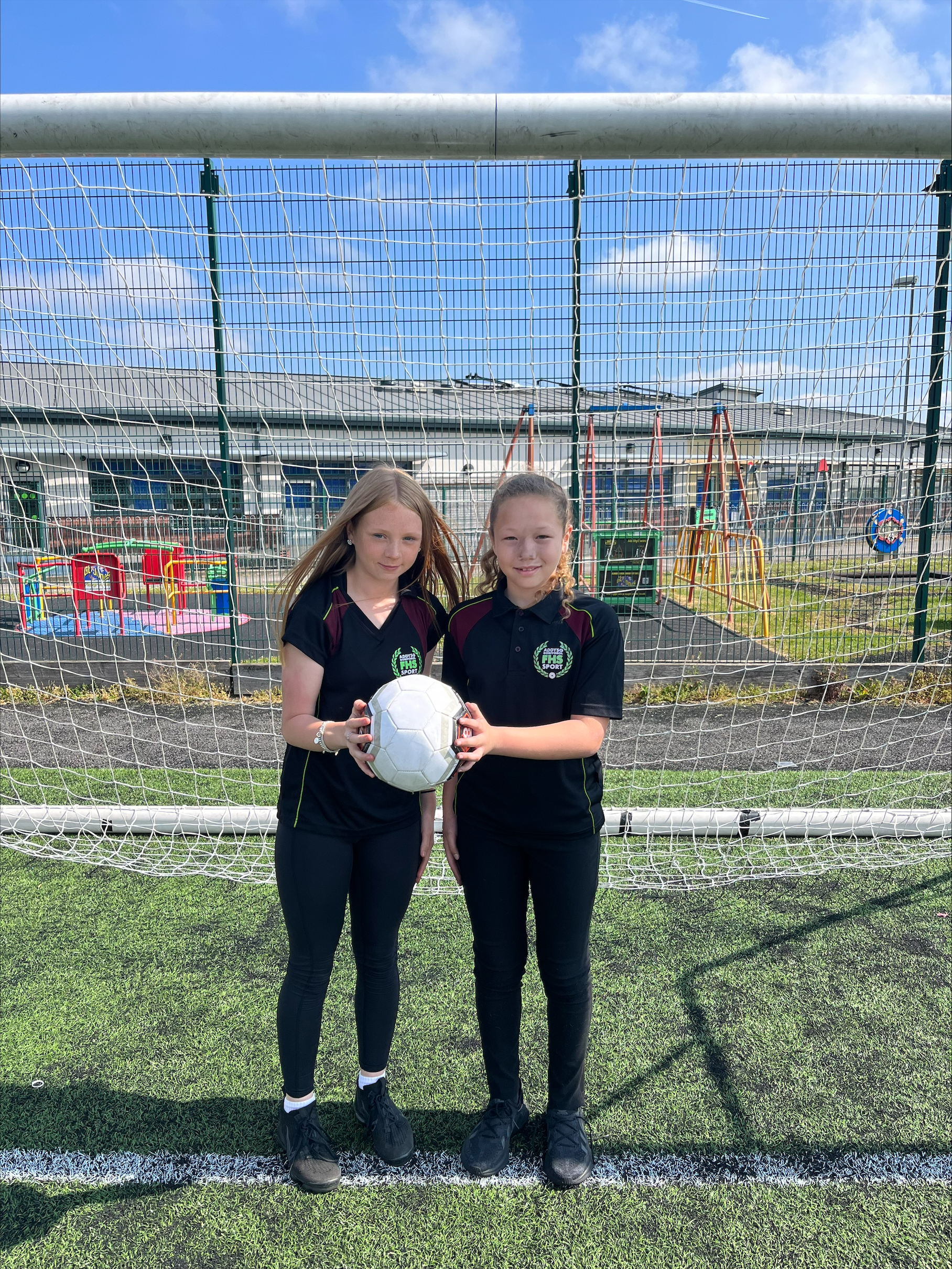 Two of the school’s football influencers, Ava Morris and Nevaeh Byles, in their Flint High School PE kits.