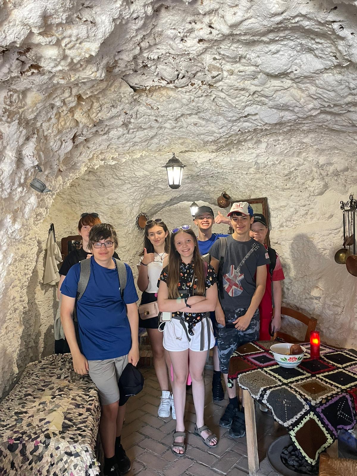 Learning about the history of the gypsy people who lived in cave houses.