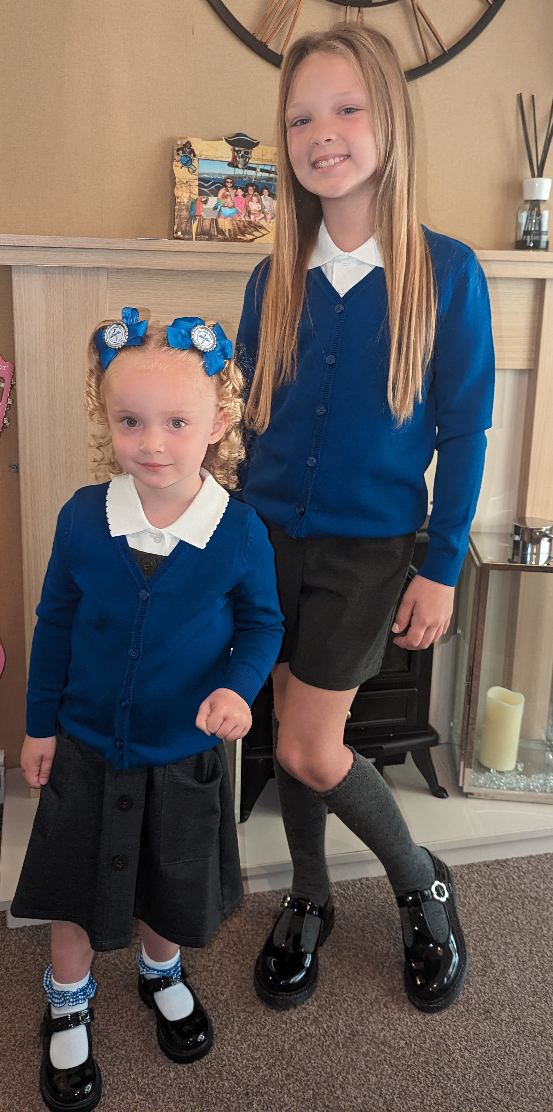 Laura Williams: Garden City in Flintshire: Sisters Maddy, nine and Harper, three. Harpers first day at big girls school, big sister Madison and family accompanied her on her first and very exciting day.