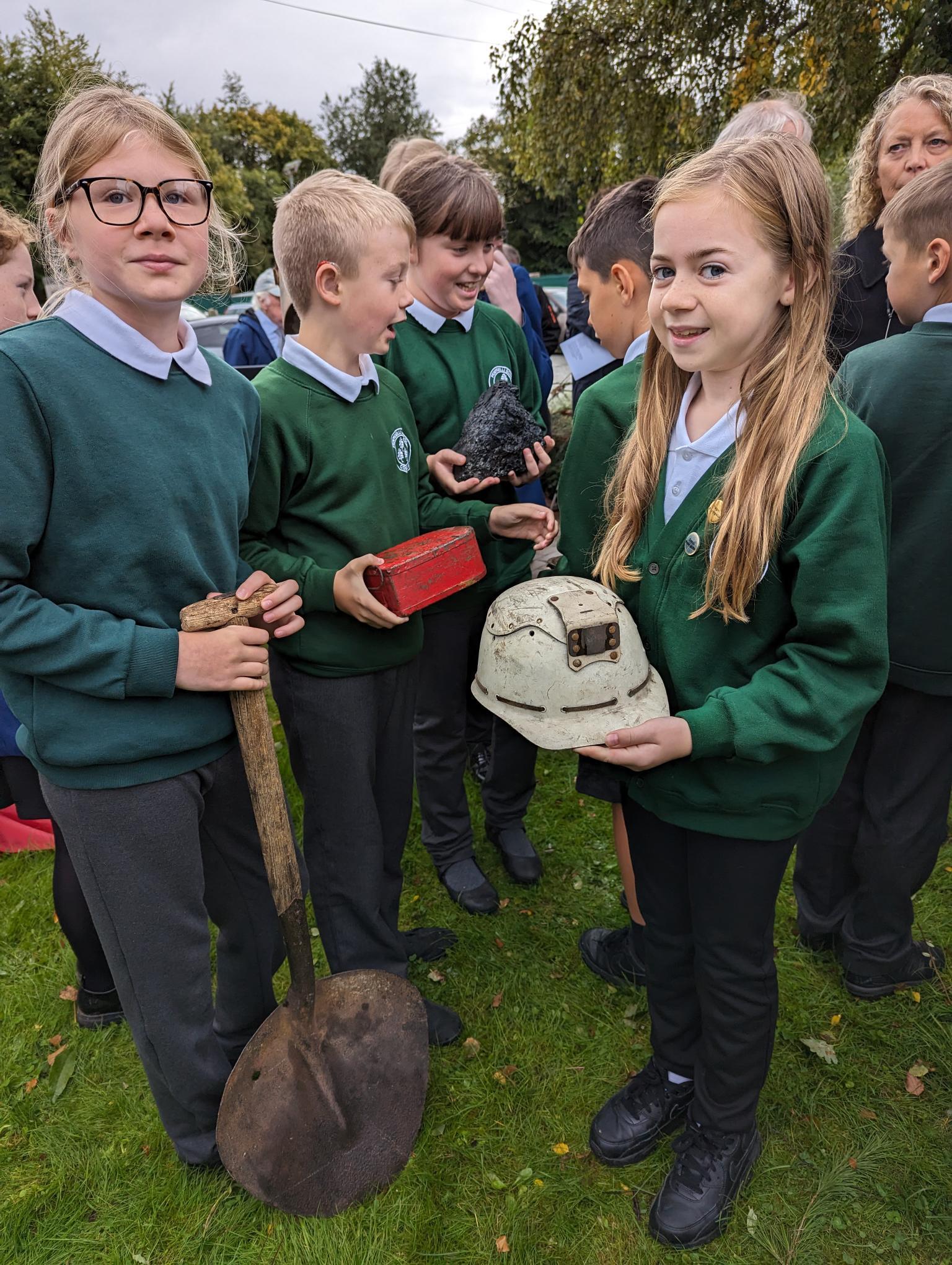 Ysgol Penygelli children with artefacts at the Gresford Disaster memorial service.